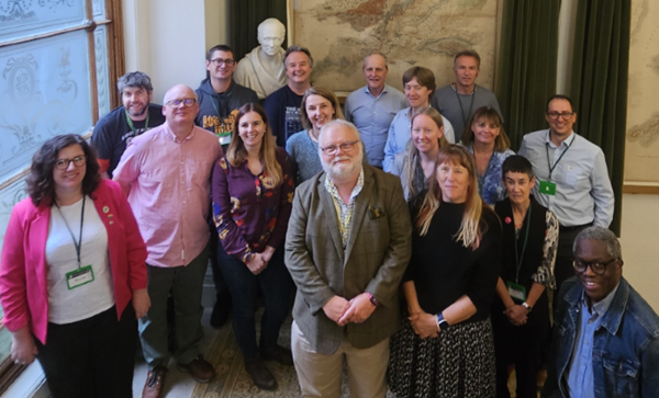 The Geological Society Council members 2024-2024 standing together on the stairway at Burlington House